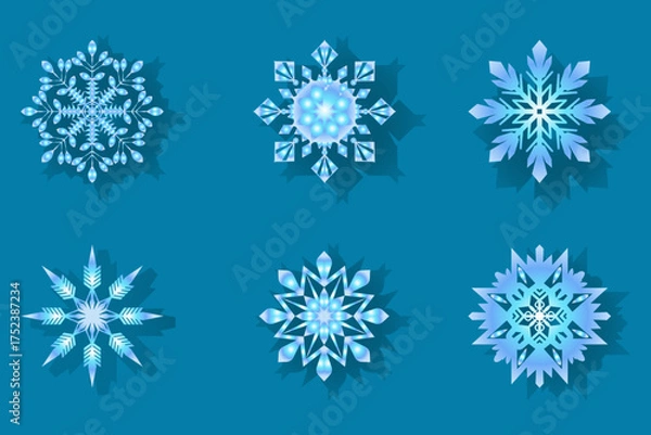 Fototapeta Collection of six detailed blue paper cut snowflakes on a turquoise background, perfect for winter decorations, Christmas graphics, and festive design projects.