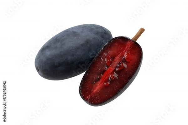 Fototapeta Haskap berry, one whole and one sliced showing ripe red flesh and seeds, isolated on a transparent background