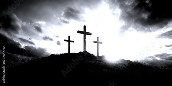 Obraz Sunset silhouettes of crosses on a hill with clouds in the background during hour