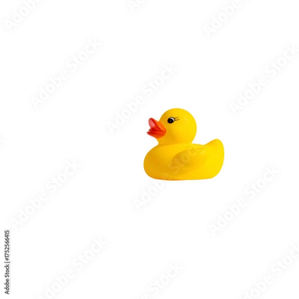 Obraz A yellow toy duck floats in darkness.