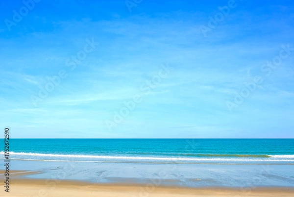 Obraz Nature of the ocean and blue sky Summer with sunshine, sandy beaches, clear blue waters sparkling against the blue sky. on an island with good ecology and environment Background for summer vacation