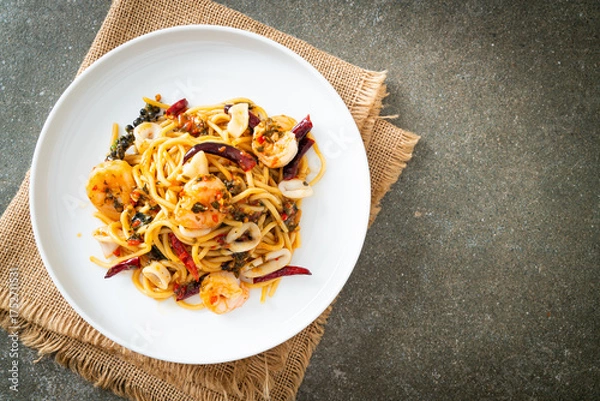 Obraz spicy spaghetti seafood on plate