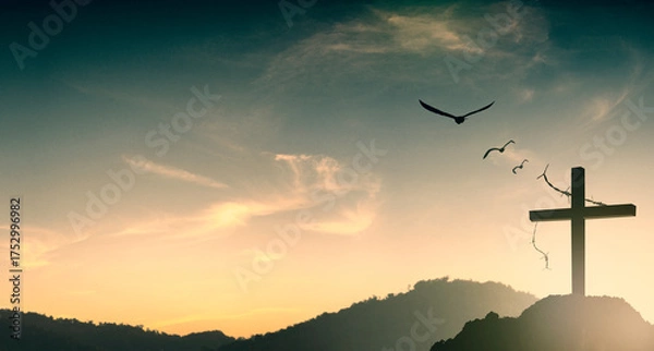 Fototapeta Silhouette of Jesus with Cross over sunset concept for religion, worship, Christmas, Easter, Redeemer Thanksgiving prayer and praise