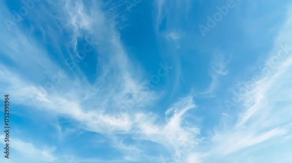 Obraz  Wispy Cirrus Clouds Adorning a Vast Azure Sky on a Clear Summer Day