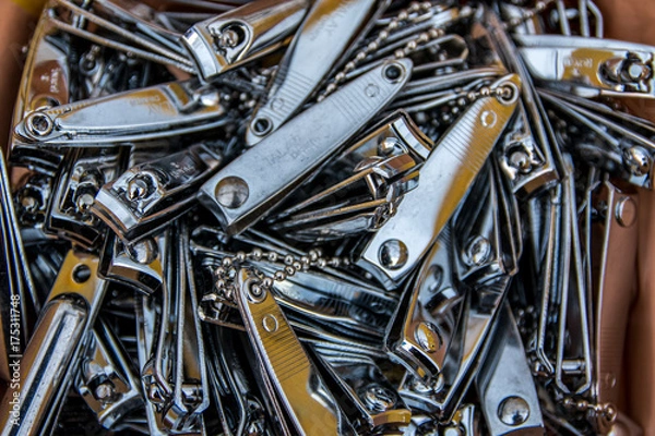 Fototapeta Viele Nagelknipser übereinander