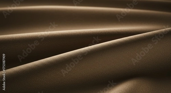 Fototapeta Elegant brown fabric texture with gentle waves and soft light