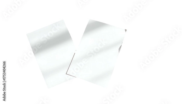 Fototapeta Two overlapping, rectangular cards with subtle light effects, set against a black backdrop