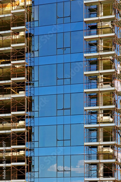 Fototapeta Glass skyscraper construction