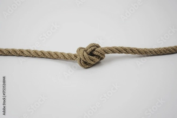 Fototapeta Close up shot of a rope with a knot