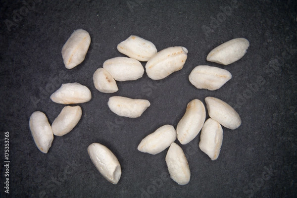 Obraz Rice beans blown on a slate floor