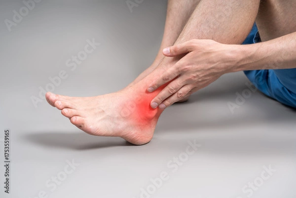 Obraz Achilles tendon injury, joint inflammation, foot pain, man suffering from feet ache, podiatry concept
