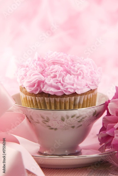 Fototapeta Delicious Pink Cupcake In A Teacup