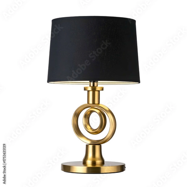 Fototapeta A decorative lamp with a black shade and a golden, spiral-like base