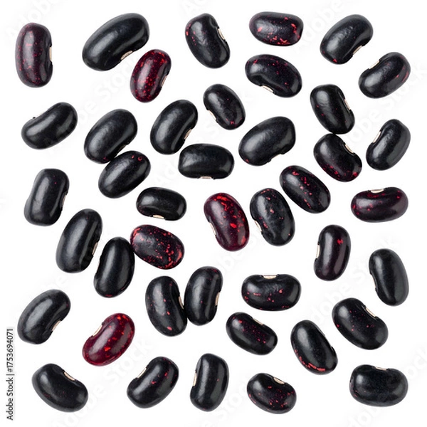 Obraz Overhead shot of numerous glossy, dark beans scattered randomly against a solid black background