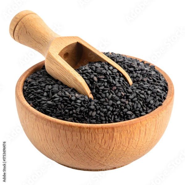 Obraz A wooden bowl filled with black seeds and a wooden scoop resting inside