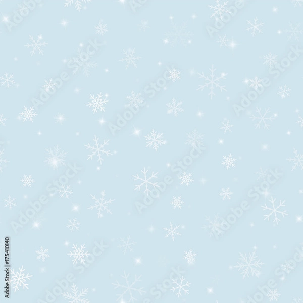 Fototapeta Magic snowflakes seamless pattern on light blue Christmas background. Chaotic scattered magic snowflakes. Shapely Christmas creative pattern. Vector illustration.