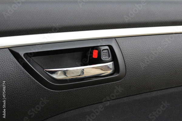 Fototapeta Close up of door control button on car.