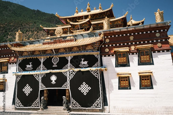 Fototapeta Songzanlin Monastery near Shangri-La, Yunnan, China. Largest Tibetan Buddhist monastery in southwest China, known as the Little Potala Palace for its majestic design