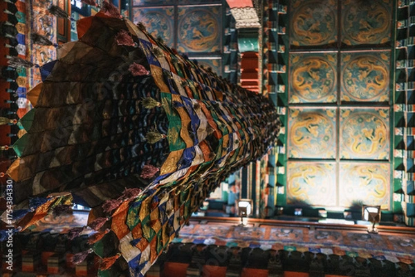 Fototapeta Intricate details of Tibetan Buddhist temple interior. Colorful paintings, sculptures, and sacred ornaments symbolizing devotion and Himalayan art heritage