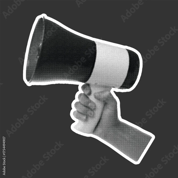 Obraz Hand holding megaphone isolated on dark background for announcement concept