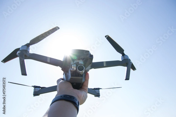 Obraz Hold a small drone in hand
