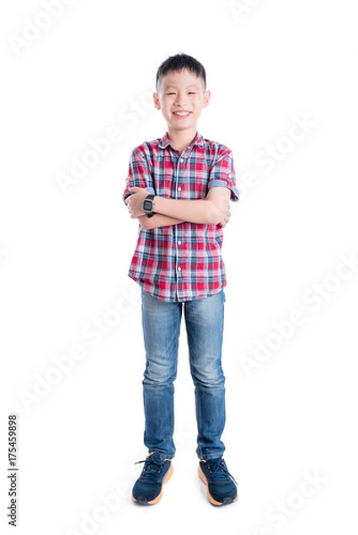 Obraz Full length of young asian boy smiling over white background