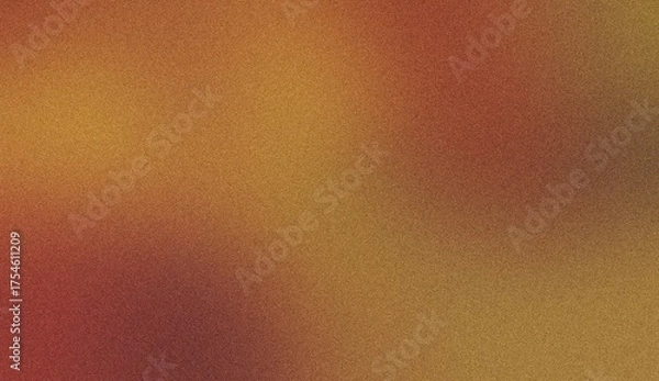 Fototapeta A warm textured abstract background featuring a blend of autumnal colors like deep orange golden yellow and burnt sienna with a subtle grainy effect