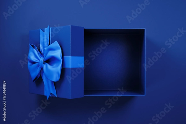 Fototapeta Top view of blue gift box with ribbon for business, holiday and celebration present. Open giftbox empty for luxury product placement mockup template. Christmas, new year, black friday shopping sale