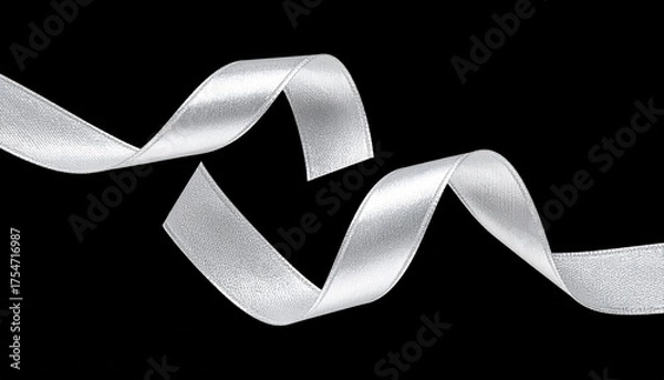 Fototapeta Elegant white satin ribbon, gracefully flowing and unfurling against a stark black backdrop, offering a luxurious and sophisticated decorative element for various design projects