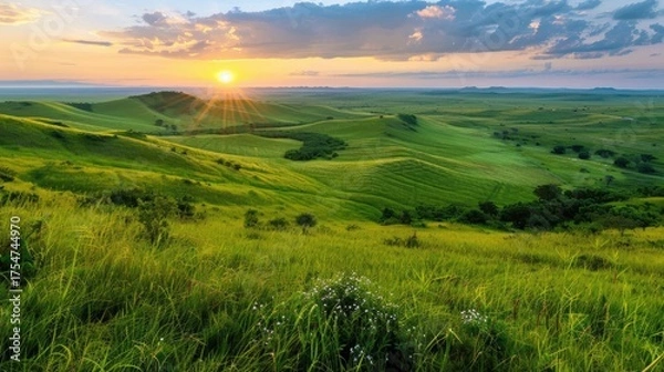 Fototapeta Serene Sunrise Over Lush Green Hills with Vibrant Sky and Beautiful Landscape in Rural Setting