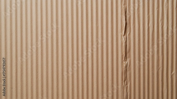 Obraz Corrugated cardboard texture: close-up shot of brown cardboard with a seam. Shows the material's repetitive pattern and subtle imperfections. Great for backgrounds.
