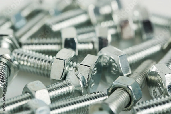 Fototapeta macro of a group of bolts and nuts