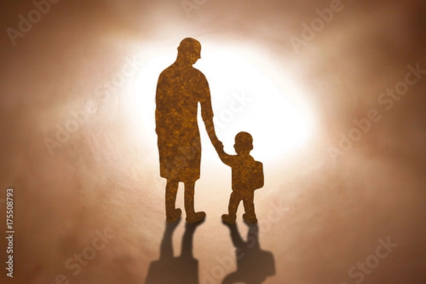 Fototapeta Mother and son walking Brown paper cut silhouette concept.