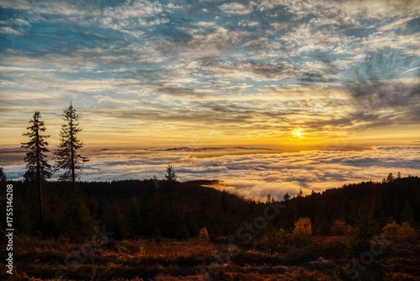 Fototapeta Sunset over mountain landscape with clouds and forest at Dreisessel in Lower Bavaria