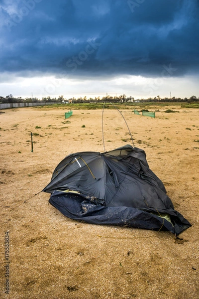 Obraz broken tent at the beach