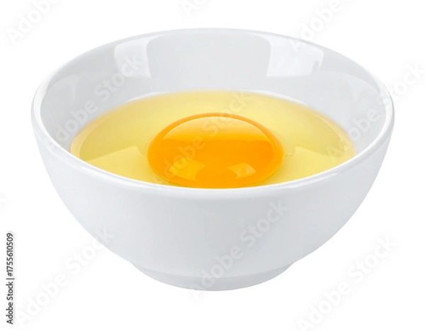 Fototapeta A single raw egg with yolk and white in a white bowl, isolated on white.