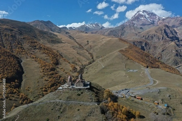 Fototapeta Aerial view of the Gergeti Trinity Church in Georgia