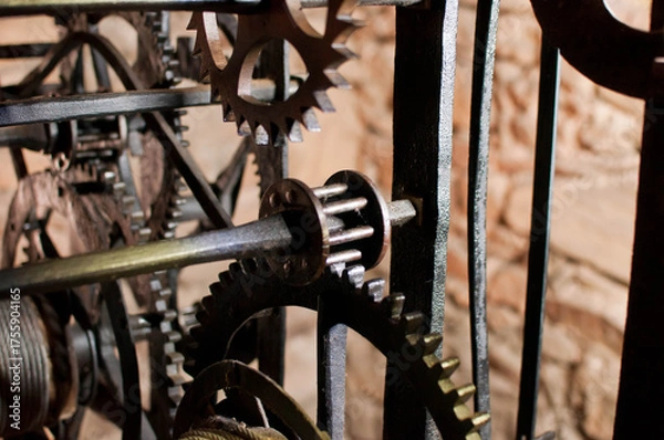 Fototapeta Antique church clock mechanism with metal gears. Perfect for illustrating vintage machinery, time concepts, history, or industrial design.