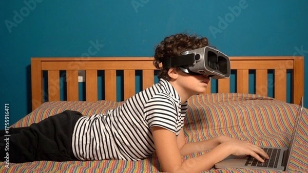 Fototapeta Little boy Immersed in cyberspace, metaverse, learning in virtual reality. Kid playing games. Child learning using virtual reality headset. Education child in virtual reality glasses. laptop and globe