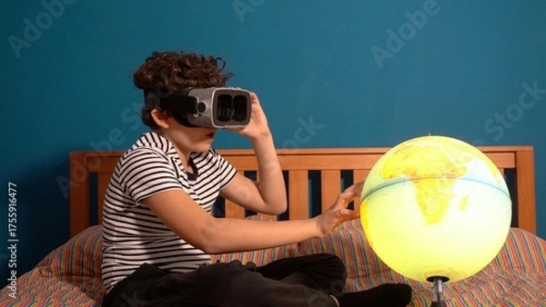 Fototapeta Little boy Immersed in cyberspace, metaverse, learning in virtual reality. Kid playing games. Child learning using virtual reality headset. Education child in virtual reality glasses. laptop and globe