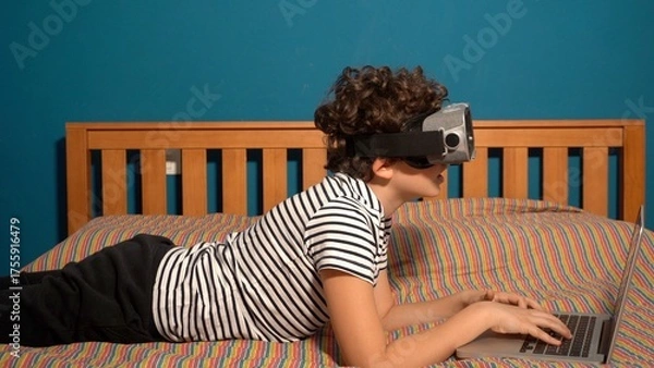 Fototapeta Little boy Immersed in cyberspace, metaverse, learning in virtual reality. Kid playing games. Child learning using virtual reality headset. Education child in virtual reality glasses. laptop and globe