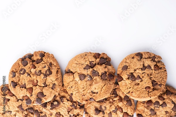 Fototapeta Chocolate chip cookies on a white background. Copy space for advertising space.