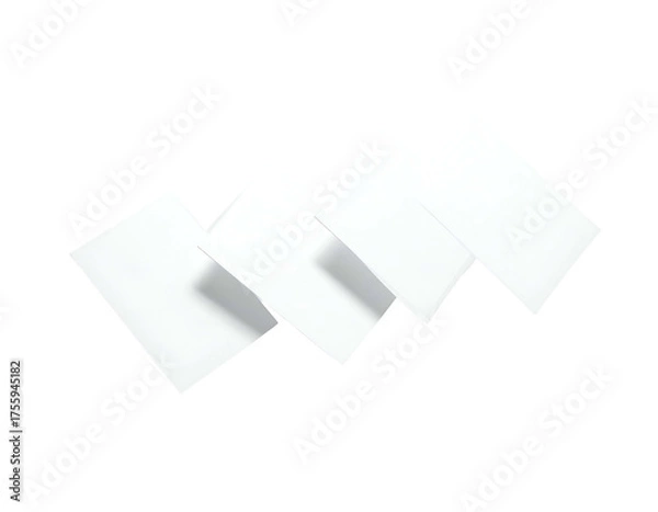 Fototapeta Four folded white squares in a diamond formation against a black background, with shadows
