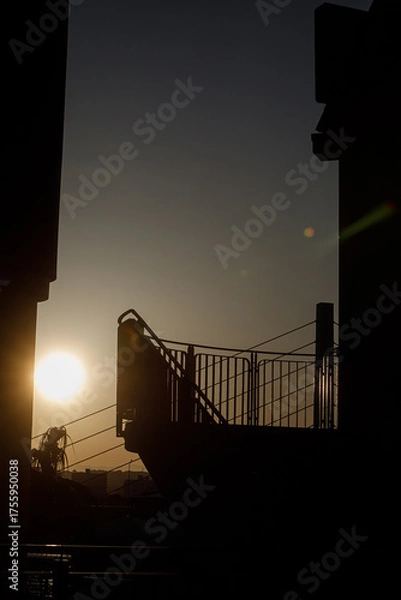 Obraz 夕焼けと都会の空