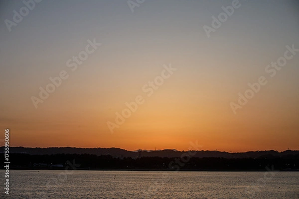 Obraz 夕焼けと都会の空