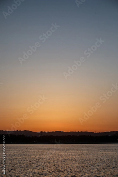 Obraz 夕焼けと都会の空