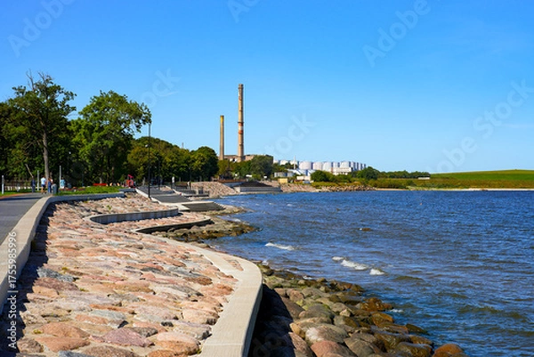 Obraz Thermal power plant and Radioactive Waste Repository hill as seen from the Sillamäe Beach Promenade along the Baltic Sea in a former Soviet closed city now located in Estonia