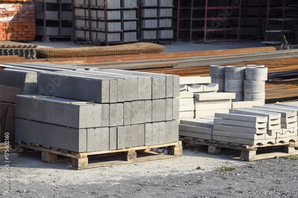Fototapeta Warehouse cinder block and products from cement slurry on the base.