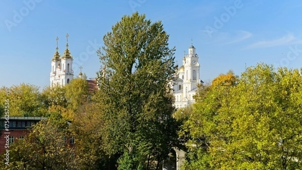 Fototapeta  Vitebsk, Belarus, October 8, 2025. Domes over the park trees in autumn.                              