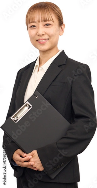Fototapeta 資料を持ったビジネススーツの女性